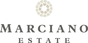 A green background with the words garcia estates in grey letters.